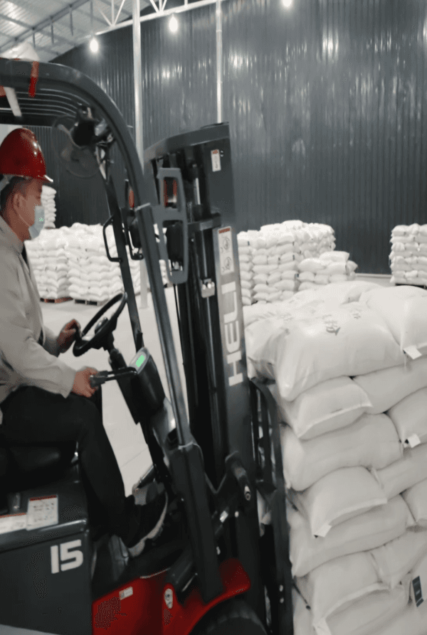 Warehouse forklift operations backing Huantai Group supply